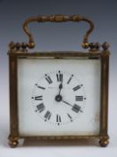 Brass carriage clock in 'squat' brass case, Mappin and Webb to enamel Roman dial, the movement