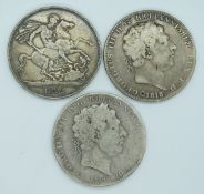 Three Georgian crowns comprising 1818, 1820 George III and a George IV 1822 example