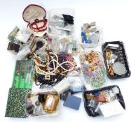 A collection of costume jewellery including beads, vintage brooches, paste, vintage necklaces, etc