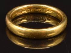 A 22ct gold wedding band/ ring, size J, 4.6g