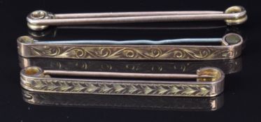 Two 9ct gold bar brooches and a 9ct rose gold pin, 7g