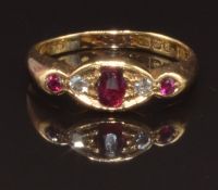 An 18ct gold ring set with rubies and diamonds, Birmingham 1919, size O, 3.7g