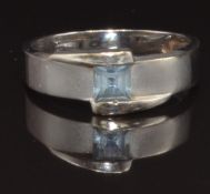 An 18ct white gold ring set with a square cut aquamarine, size N, 3.4g