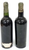 Two bottles Barros 1945 vintage port, bottled by John Porter and Gold... London, label part
