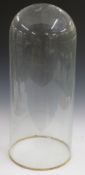 A glass dome suitable for a clock, model or taxidermy, diameter 26cm, height 61cm