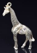 Franz Hirner 18ct gold pendant in the form of a giraffe set with two diamonds, 4 x 1.5cm, 13g