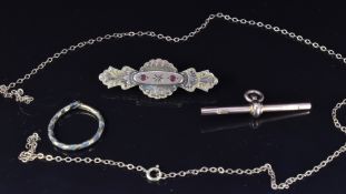 A 9ct gold brooch set with a diamond and paste with hair compartment verso, 9ct gold T bar and a