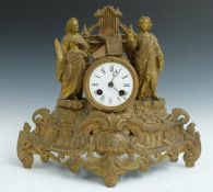 19thC figural mantel clock with Roman enamel dial, Breguet style hands, and two train movement