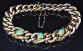 Edwardian 9ct gold curb link bracelet set with three turquoise cabochons, 18.6g