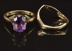 A 9ct gold ring set with an amethyst, 2.6g, size R, and a 9ct gold ring, 1.3g, size K