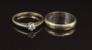 A 9ct gold ring set with a diamond and a 9ct gold wedding band/ ring, size M, 4.1g