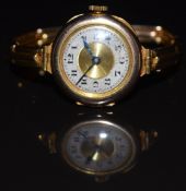 Unnamed 9ct gold ladies wristwatch with blued hands, black Arabic numerals, silver and gold dial and