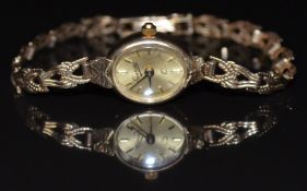 Everite 9ct gold ladies wristwatch with gold hands, hour markers and dial, on 9ct gold bracelet,
