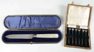 Cased set of hallmarked silver cocktail sticks and a cased hallmarked silver bladed mother of
