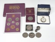 Silver cased pocket watch marked 0935, 1970 coin set, white metal thimble case, coins and Pierre