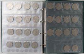 A collector's album containing UK coinage, modern crowns etc, includes approximately 1632g of pre-