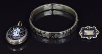 Victorian bangle set with black enamel and a Victorian mourning locket set with black and white