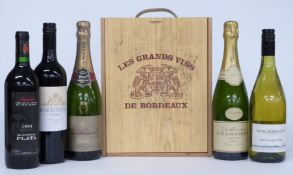 Eight bottles of red and white wine and champagne including Chateau Haut Cantenac Saint-Emilion