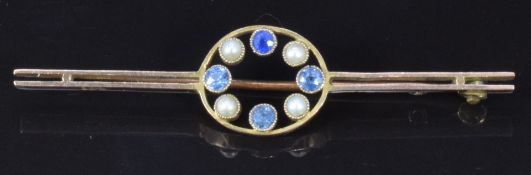 A 9ct gold brooch set with sapphires and seed pearls, 5cm, 2.3g
