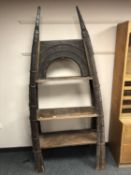 A set of African style bookshelves,