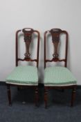 A pair of Victorian mahogany dining chairs