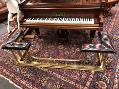 A good quality brass and Burgundy leather club fender,