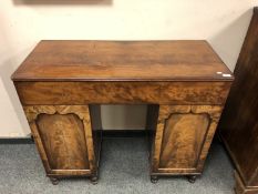 A Regency mahogany twin pedestal sideboard,