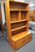 A mid 20th century teak bookcase