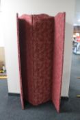 A four fold fabric room divider