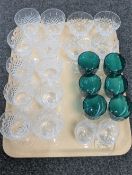 A tray of cut crystal and glass, coloured glasses.