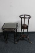 A mahogany plant stand fitted with two drawers together with a nest of two mahogany tables