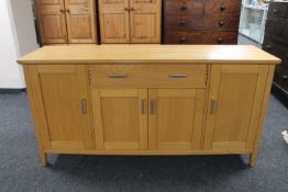 A contemporary oak sideboard