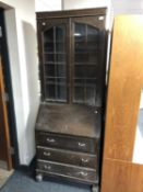 A 1930's oak bureau bookcase