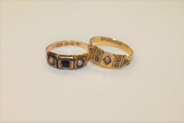 Two antique 15ct gold pearl rings (2)