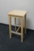 A pine breakfast bar stool