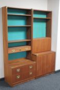 A mid 20th century teak twin section bureau bookcase