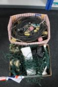 Two boxes of Christmas decorations and outdoor lights,