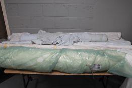 Ten rolls of fabric and material