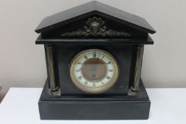 A Victorian slate mantel clock