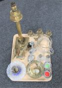 A tray of metal and brass ware, brass figure of an eagle, lamp base,