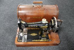 A mid 20th century cased Singer sewing machine