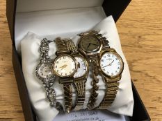 A lady's 9ct gold wristwatch on plated expansion strap, together with two Rotary watches,