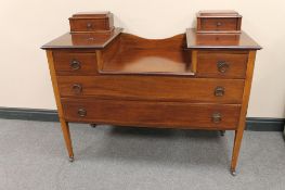A Victorian inlaid mahogany sunk centre dressing table (no mirror)