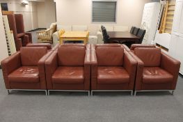 Four contemporary brown leather look armchairs