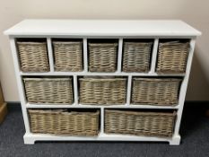 A contemporary unit fitted with ten wicker baskets