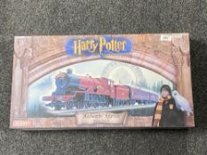 A boxed Hornby Harry Potter and The Philosopher's Stone Hogwarts Express electric train set