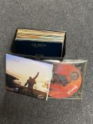 A record case containing LP records mainly Queen, Meat Loaf,