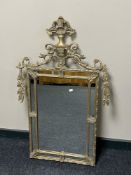 A contemporary gilt framed Victorian style wall mirror