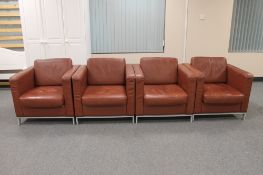 Four contemporary brown leather look armchairs
