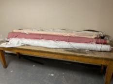 Ten assorted rolls of fabric